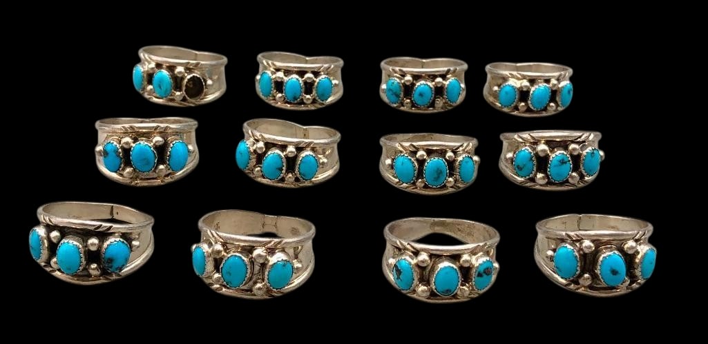 12 Sterling Silver And Turquoise Rings Similar In Design: Offered here for your consideration are 12 sterling silver & turquoise rings similar in design. Each piece features three turquoise cabochons set in sawtooth silver bezels accented with silver dot