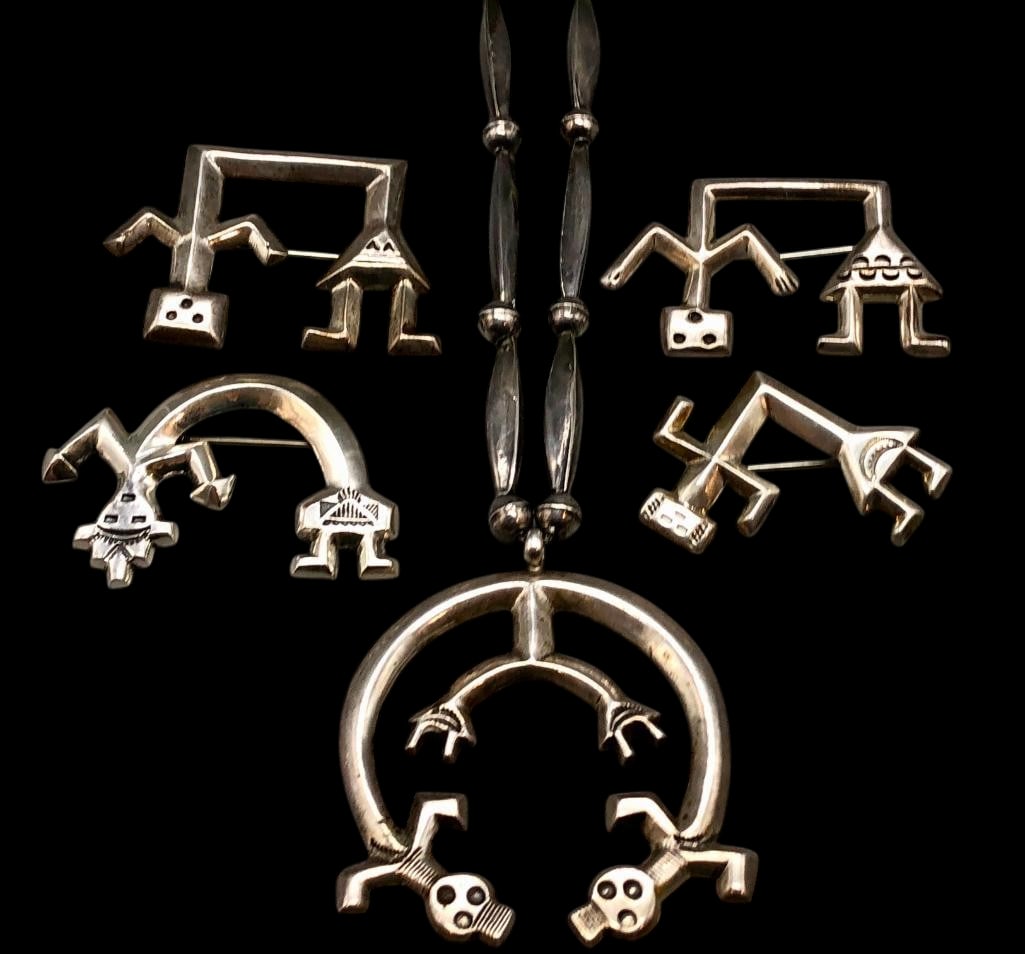 Sterling Silver Rainbow Man Theme Necklace With Four Pins: Offered here for your consideration is a sterling silver Rainbow Man theme necklace with four pins. Each piece showcases a Rainbow Man figural design accented with hand stamped designs. The naja on th