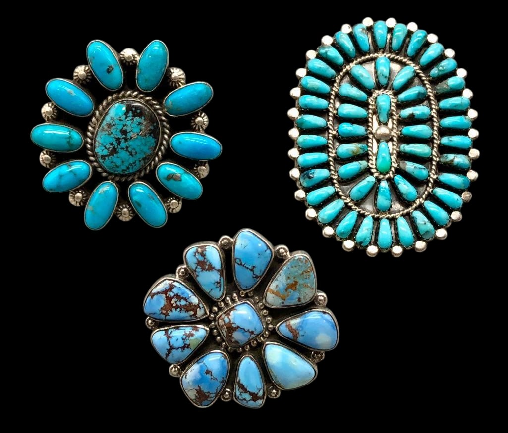 Three Cluster Turquoise And Sterling Silver Rings: Offered here for your consideration are three cluster turquoise and sterling silver rings. Each piece features a cluster of turquoise cabochons set in smooth or sawtooth silver bezels. Accenting the s