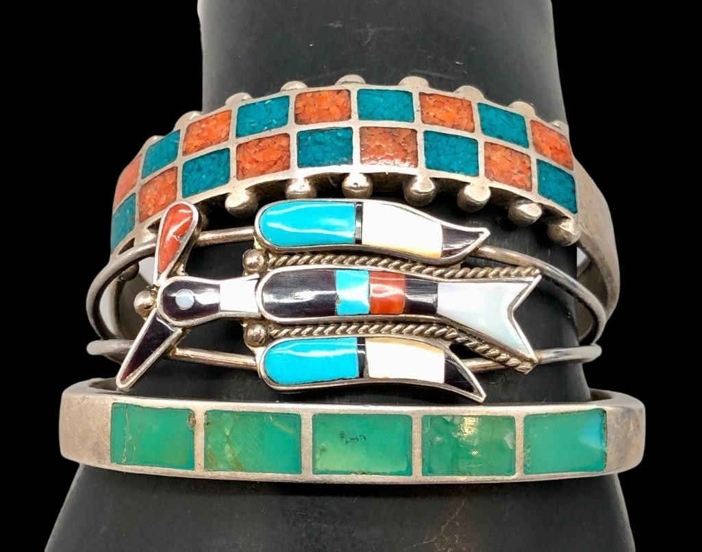 Three Sterling Silver Inlay Bracelets: Offered here for your consideration are three sterling silver inlay bracelets. Each piece features an inlay design including flush, chip and channel. The stones include turquoise, coral, mother of