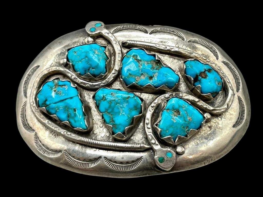 Sterling Silver And Turquoise Belt Buckle By Effie C.: Offered here for your consideration is a sterling silver and turquoise belt buckle by Effie C. This piece features six turquoise nugget cabochons set in sawtooth silver bezels accented with silver