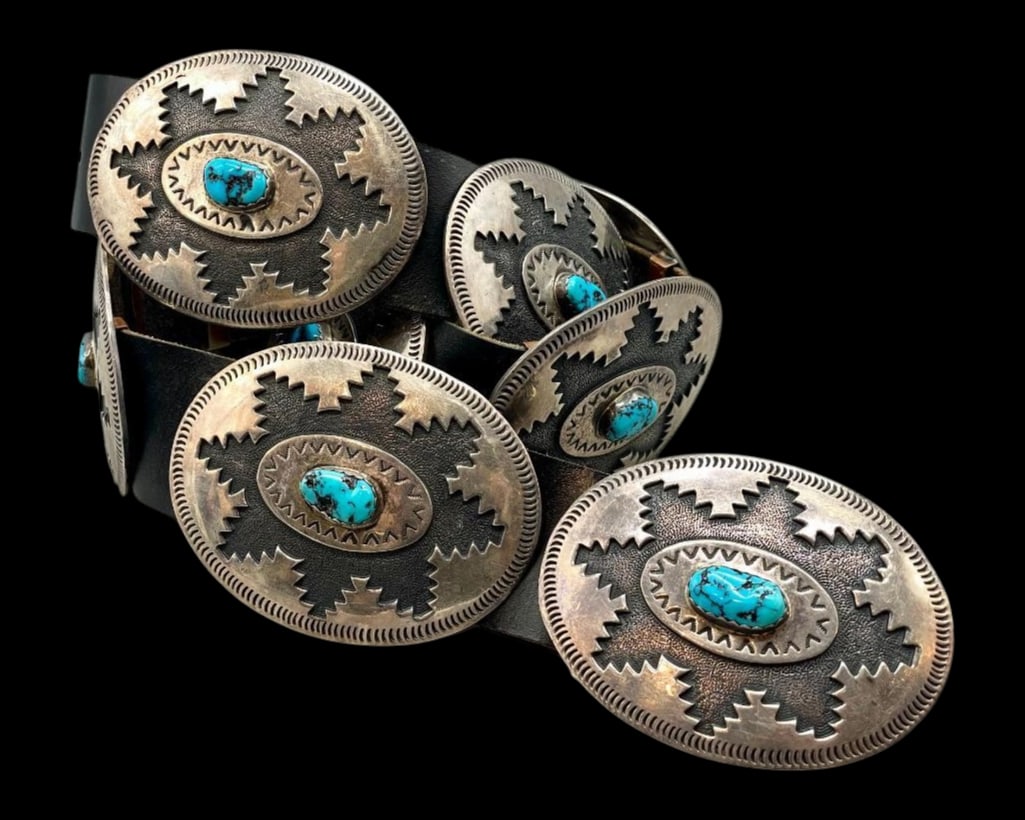 Sterling Silver And Turquoise Overlay Concho Belt: Offered here for your consideration is a sterling silver and turquoise overlay concho belt. This piece features nine oval conchos and matching buckle each highlighted with a turquoise cabochon set in