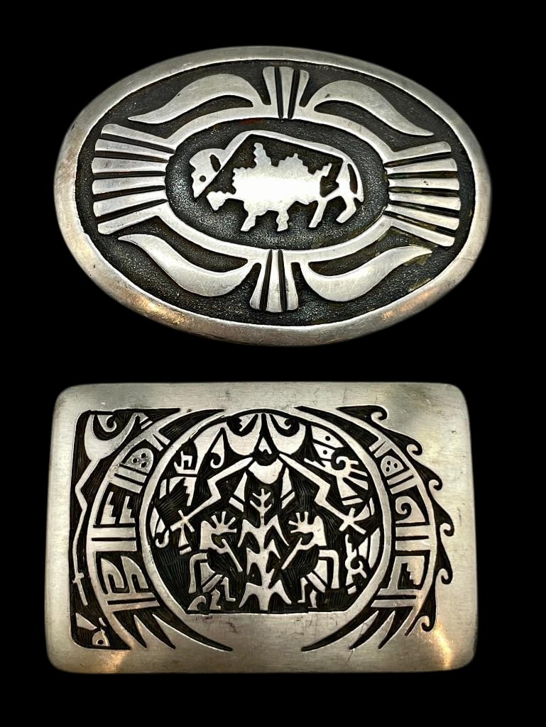 Sterling Silver And Overlay Belt Buckles: Offered here for your consideration are sterling silver and overlay belt buckles. Both pieces feature overlay style designs on a darkened silver background. Add these buckles to your collection. Bid