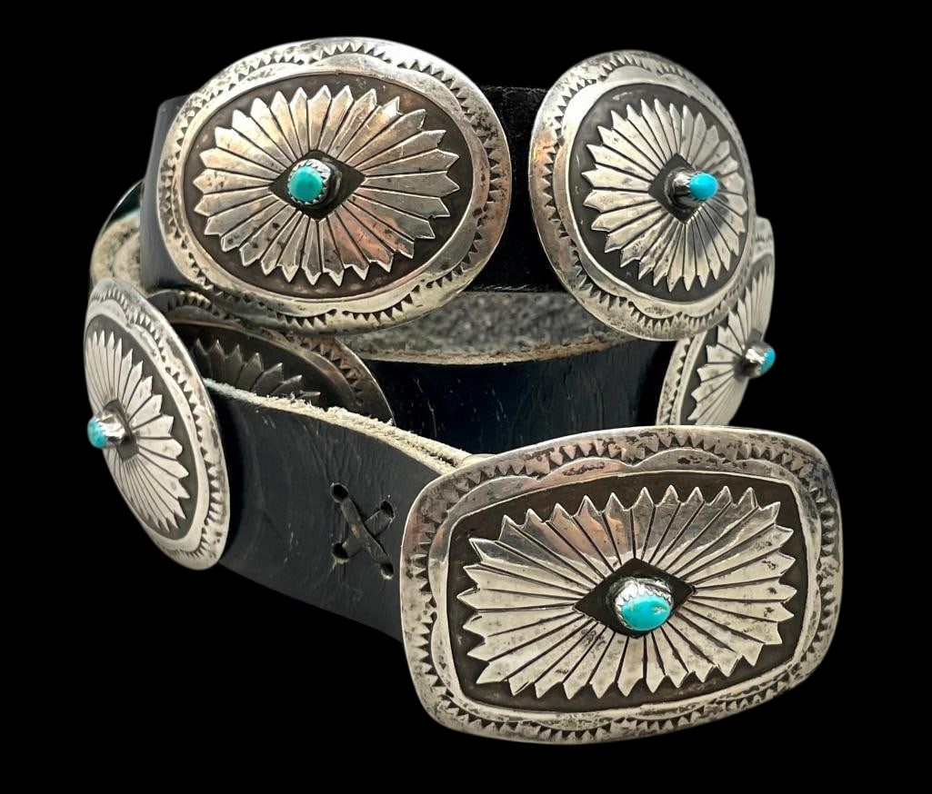 Sterling Silver And Turquoise Smaller Size Concho Belt: Offered here for your consideration is a sterling silver and turquoise smaller size concho belt. The belt has nine oval conchos and a rectangular buckle. Each highlighted with a turquoise cabochon
