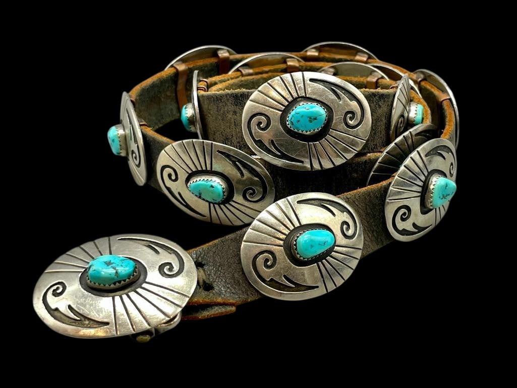 German Silver And Turquoise Small Size Concho Belt/Hat Band: Offered here for your consideration is a German silver and turquoise small size concho belt/hat band. This piece features 14 oval conchos and a matching buckle each highlighted with a turquoise