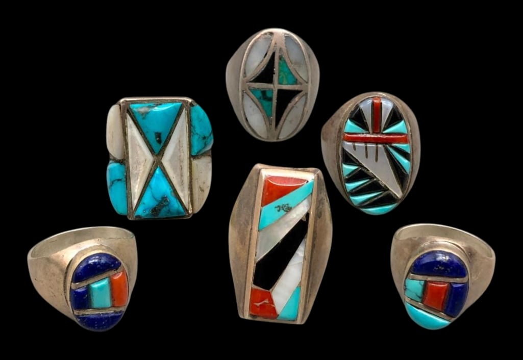 Six Sterling Silver And Multi Stone Inlay Rings: Offered here are six sterling silver and multi stone inlay rings. These pieces feature intricate multi stone inlay work with turquoise, coral, mother of pearl, onyx, lapis and others, all set into