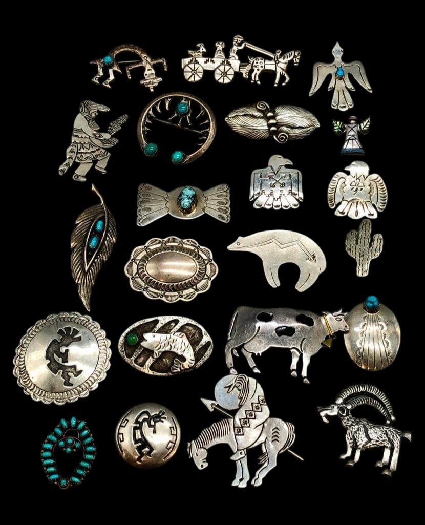 Group Of Sterling Silver Pins: Offered here for your consideration is a group of 22 sterling silver pins. The pieces showcase a variety of designs, including cows, Kokopellis, cacti, leaves, Thunderbirds, Rainbowman figures, fish,