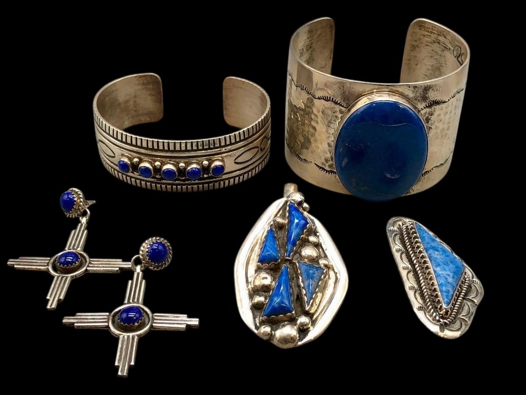 Two Sterling Silver And Lapis Bracelets With Earrings, Pin And Pendant: Offered here for your consideration are two sterling silver and lapis bracelets with earrings, pin and pendant. The pieces each feature lapis cabochons set in silver bezels. Accenting the stones are