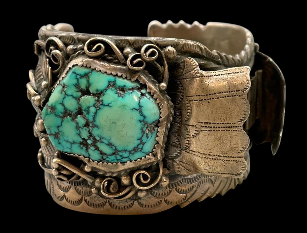 Vintage Sterling Silver And Turquoise Watch Cuff: For your bidding enjoyment we present a vintage sterling silver and turquoise watch cuff. This bracelet features two turquoise cabochons set in silver bezels. *NOTE: One of the stones is a little