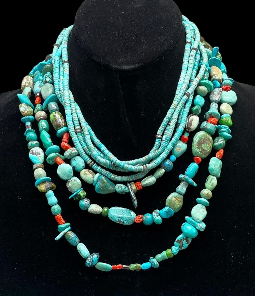 Two Multi Stone Turquoise Necklaces: Available here for your consideration are two multi stone turquoise necklaces. One necklace features five strands of turquoise disc beads accented throughout with hand stamped sterling silver beads. T