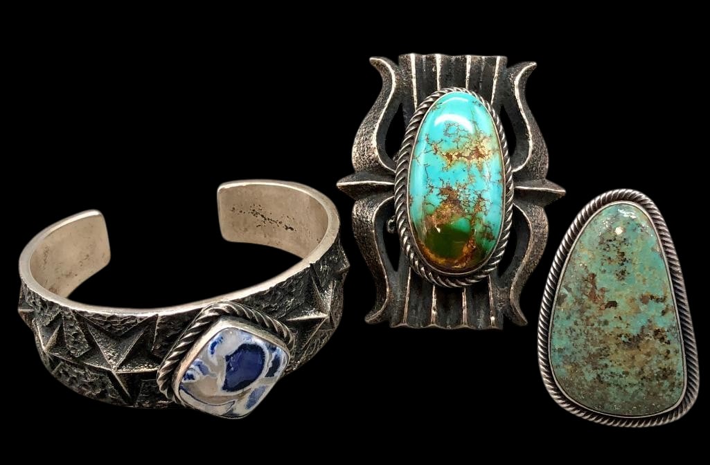 Kevin Yazzie Tufa Cast Bracelet with Various Settings And Two Rings: Offered here for your consideration is a Kevin Yazzie tufa cast bracelet with various settings and two rings. Each piece feature a turquoise or a blue and white stone set in a smooth silver bezel. Acc