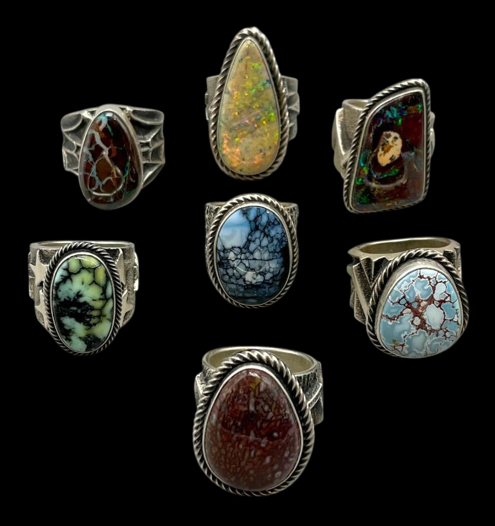 Seven Tufa Cast Rings With Various Stones (1 of 12)