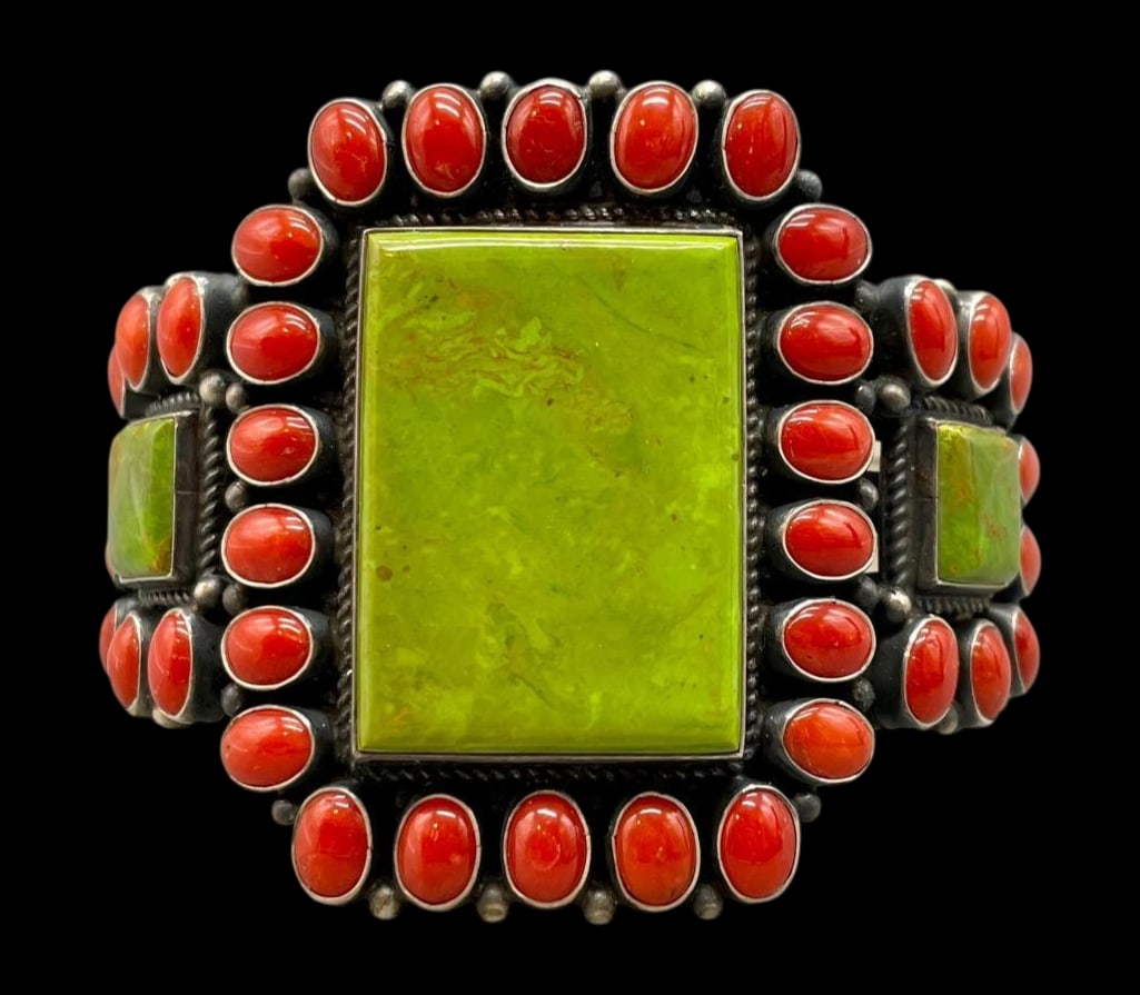 Sterling Silver Coral and Gaspeite Bracelet By Anthony Skeets: Offered here for your consideration is a sterling silver coral and gaspeite bracelet by Anthony Skeets. This piece features three square shaped green stone (possibly gaspeite or green turquoise) and a