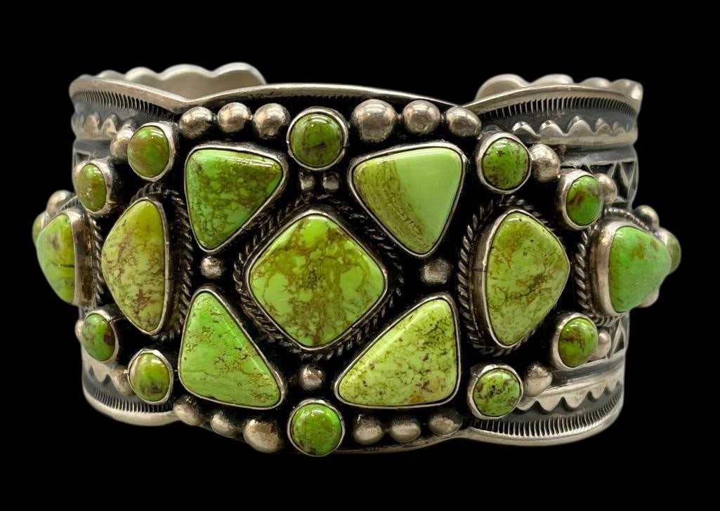Sterling Silver And Green Turquoise Cluster Bracelet by Darrell Cadman: Offered here for your consideration is a sterling silver and green turquoise cluster bracelet by Darrell Cadman. This piece features a cluster of green turquoise cabochons (possibly Carico Lake) set i