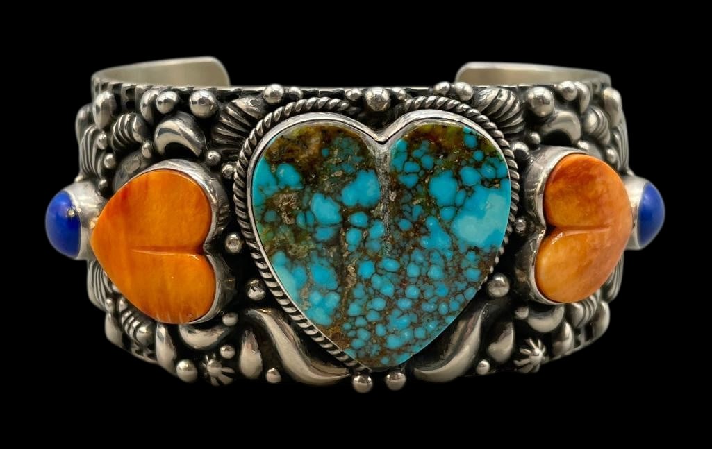 Tsosie Orville White Sterling Silver Turquoise, Spiny Oyster and Lapis Bracelet: Offered here for your consideration is a Tsosie Orville White sterling silver turquoise, spiny oyster and lapis bracelet. This piece features lapis, turquoise and spiny oyster cabochons, with some sho