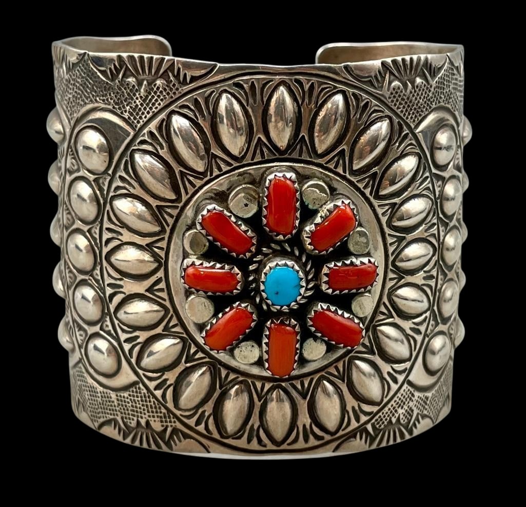 Sterling Silver, Coral And Turquoise Wide Style Bracelet By Wilbert Benally: Offered here for your consideration is a sterling silver, coral and turquoise wide style bracelet by Wilbert Benally. This piece features eight coral cabochons and one turquoise cabochon set in sawtoo