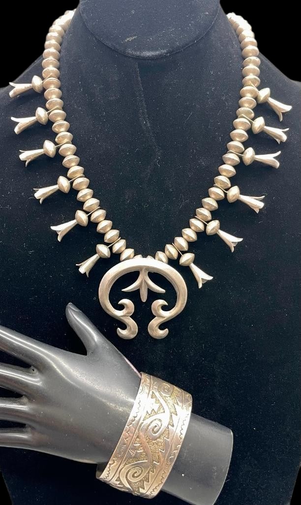 Vintage Naja and Blossom Themed Necklace With Overlay Bracelet: Offered here for your consideration is a vintage naja and blossom themed necklace with overlay bracelet. The necklace features a cast carinated naja highlighted with 12 matching blossoms along the nec