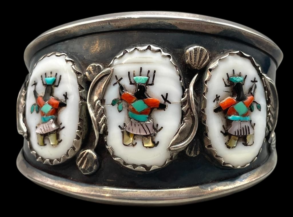 Sterling Silver And Multi Stone Kachina Theme Inlay Bracelet: Presented for your consideration is a sterling silver and multi stone Kachina theme inlay bracelet. This beautiful bracelet features a three Kachina figures created with inlay of turquoise, coral, ony