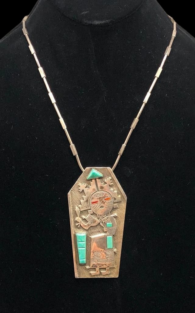 Vintage Sterling Silver, Turquoise And Coral Kachina Theme Pendant Necklace: Offered here for your consideration is a vintage sterling silver, turquoise and coral Kachina themed pendant necklace. This large pendant showcases an overlay design of a Kachina, accented with turquo