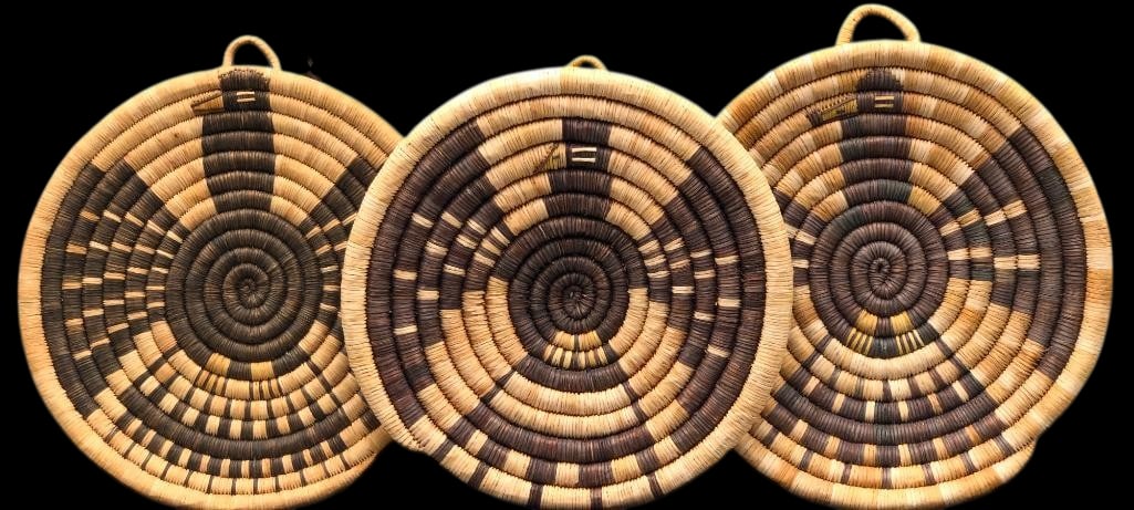 Three Eagle Theme Hopi Coil Baskets: For your bidding pleasure are these three Eagle theme, Hopi coiled, plaque baskets. Each is round and shaped like a wall plaque and all three have an Eagle motif with it's wings spread. Each
