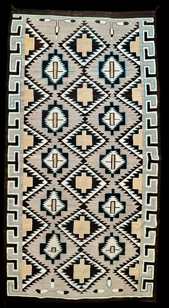 Non Regional Navajo Rug With Crosses Circa 1950s: Available here for your consideration is this non regional design Navajo rug with crosses from circa the 1950s. This rug was woven with hand carded and hand spun wool and features diamond patterns