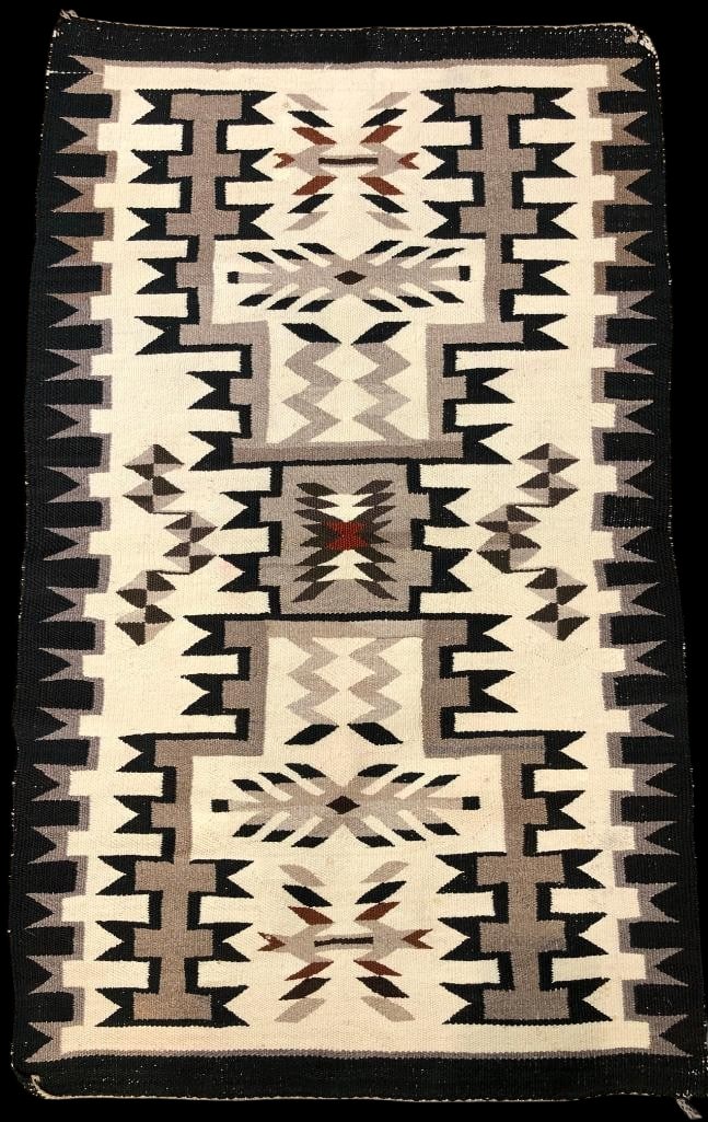 Vintage Storm Pattern Navajo Rug: Available here for your consideration is a vintage storm pattern Navajo rug. This rug was made with hand carded hand spun wool and features a classic storm pattern with geometric designs in black,