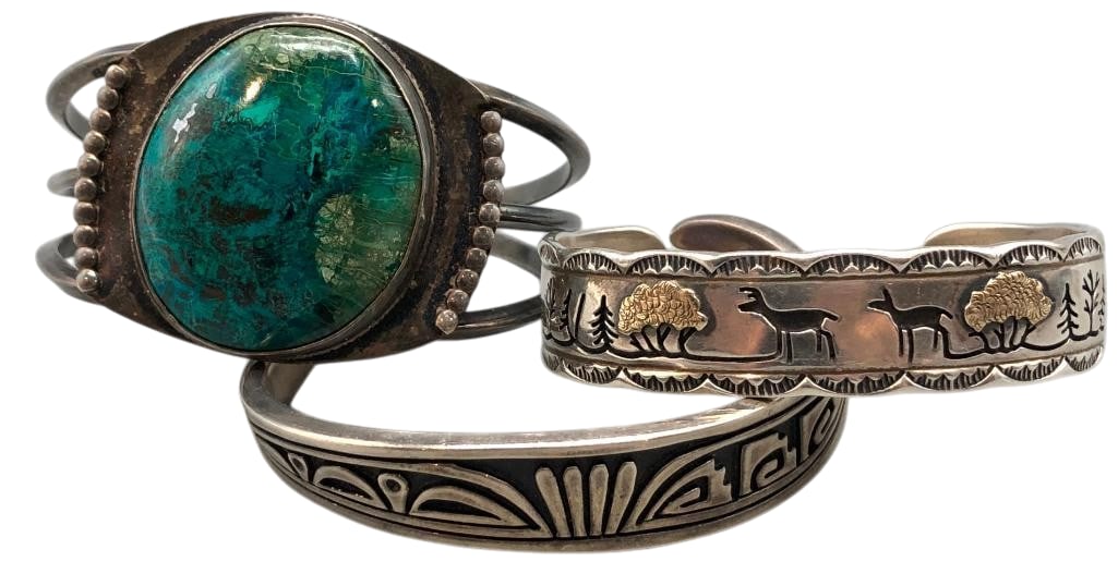 Three Sterling Silver Bracelets With Various Designs: Offered here for your consideration are three sterling silver bracelets with various designs. Two of the bracelets feature overlay style designs on darkened silver background with one further highligh
