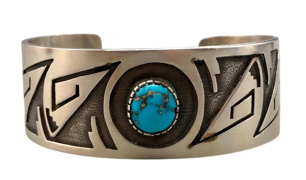 Sterling Silver And Turquoise Overlay Bracelet by Herman Vandever: Offered here for your consideration is a sterling silver and turquoise overlay bracelet by Herman Vandever. This piece features a turquoise cabochon set in a serrated silver bezel accented with overla