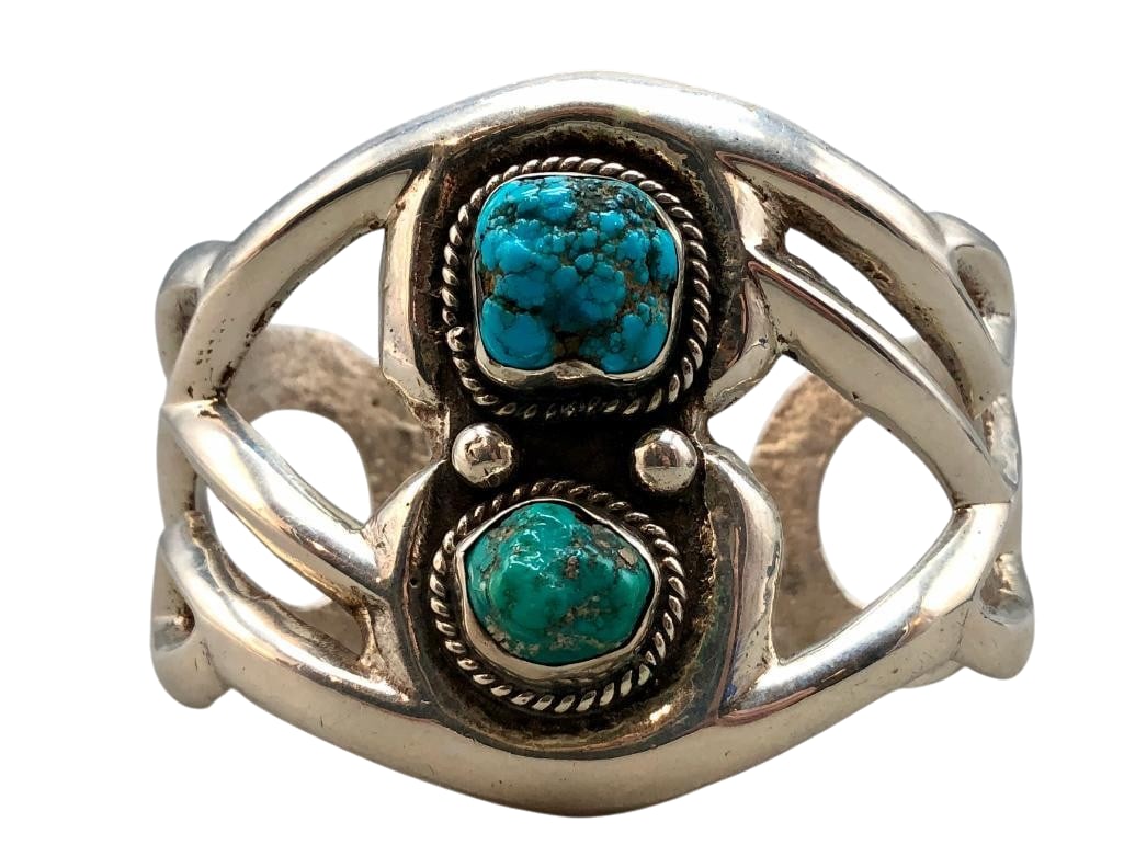 Turquoise And Sterling Silver Sandcast Bracelet By Monroe Ashley: Offered here for your consideration is a turquoise and sterling silver sandcast bracelet by Monroe Ashley. This piece features two turquoise nugget cabochons set in smooth silver bezels. The stones ar