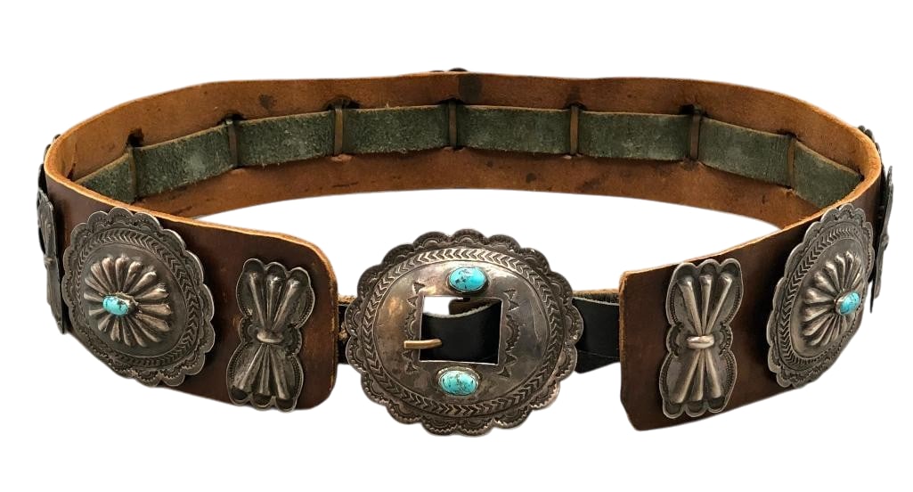 Circa 1940s Sterling Silver And Turquoise Concho Belt: Offered here for your consideration is a circa 1940s sterling silver and turquoise concho belt. The belt has eight butterfly conchos, seven oval conchos and a buckle. The pieces are highlighted with r