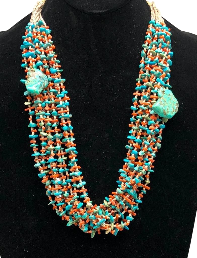 10 Strand Turquoise, Coral And Heishi Necklace With Pueblo Wrap: Offered here for your consideration is a 10 strand turquoise, coral and Heishi necklace with Pueblo wrap. This necklace features 10 strands of coral and turquoise beads set between light brown Heishi 