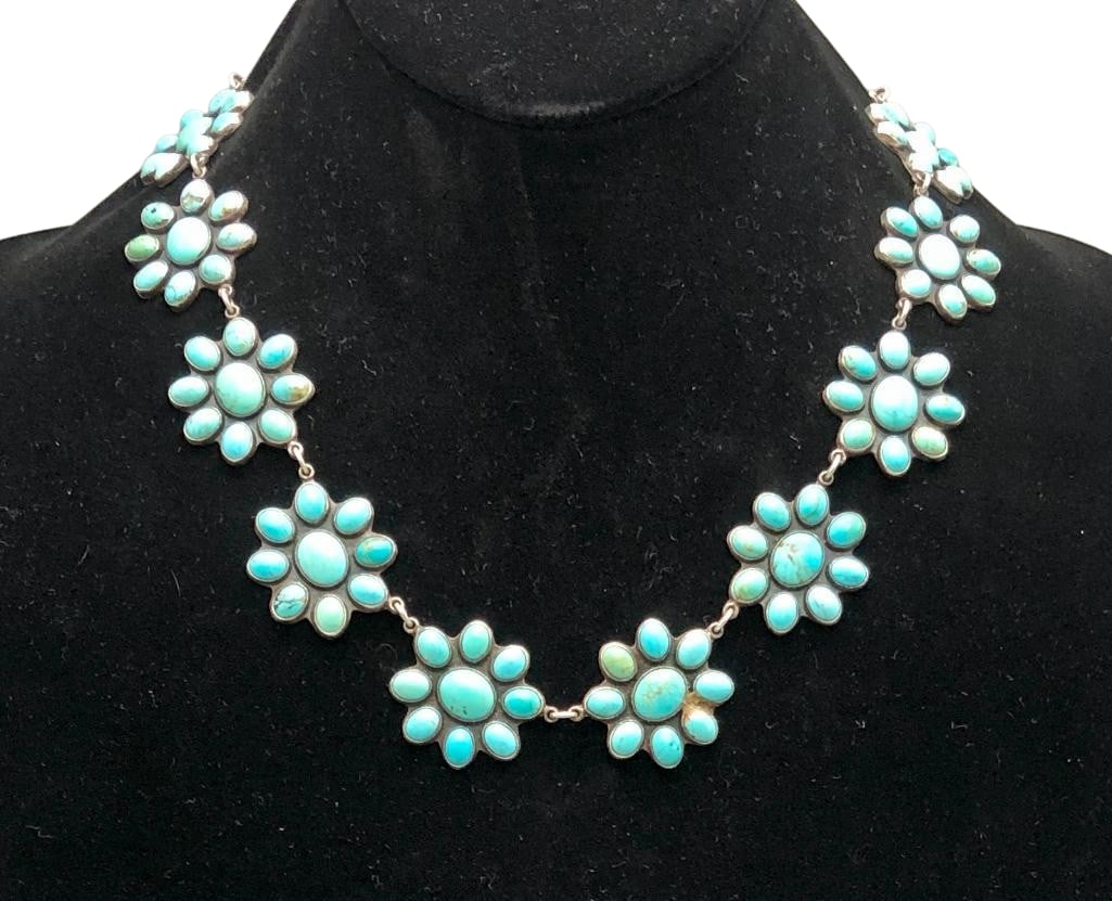 Turquoise Cluster And Sterling Silver Necklace By Federico Jimenez: Offered here for your consideration is a turquoise cluster and sterling silver necklace by Federico Jimenez. This necklace features a neckline filled with 14 pendants each showcasing the same design l