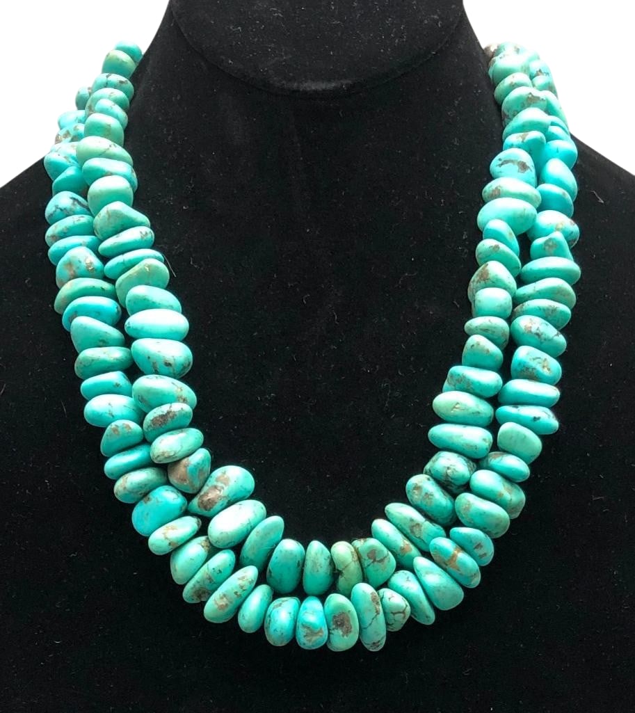 Two Strand Turquoise Nugget And Bead Necklace: Offered here for your consideration is a two strand turquoise nugget and bead necklace. This piece features strands of turquoise nugget beads in graduated sizes accented with silver beads. The beads a