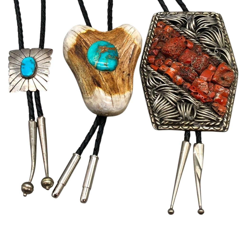 Three Unique Style Bolo Ties: Offered here for your consideration are three unique style bolo ties. Two of the slides feature a turquoise cabochon with one set in a smooth silver bezel and the other on an antler background. The th