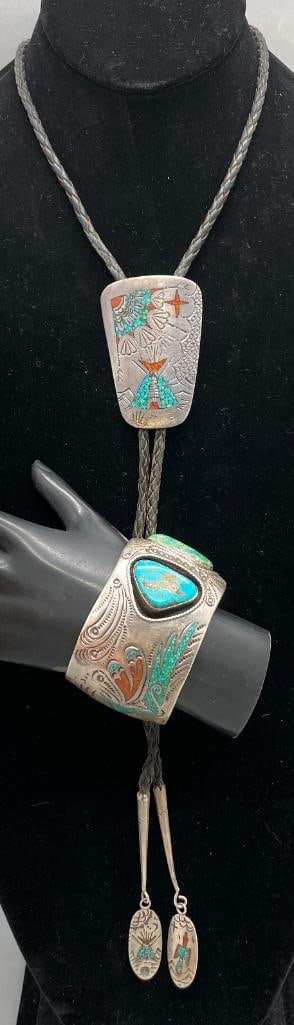Vintage Sterling Silver, Turquoise And Coral Bracelet With Bolo Tie: For your bidding enjoyment we present a vintage sterling silver, turquoise and coral bracelet with bolo tie. This bracelet features two turquoise cabochons set in smooth silver bezels against shadowbo