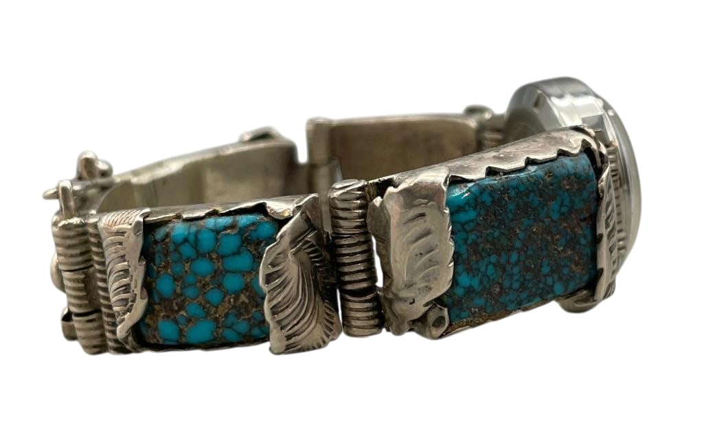 High Grade Northern Nevada Turquoise And Sterling Silver Link Watch Bracelet: Offered here for your consideration is a high grade Nevada turquoise and sterling silver link watch bracelet. This beautiful piece features five Nevada turquoise cabochons with great webbing set in sc