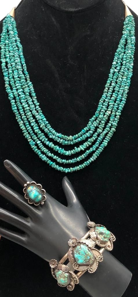 Five Strand Turquoise Nugget Necklace With Bracelet And Ring: Offered here for your consideration is a five strand turquoise nugget necklace with bracelet and ring. The necklace features five strands of turquoise nugget beads strung on waxed cord with silver tip