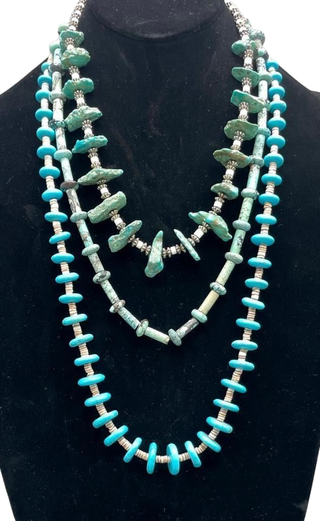 Three Turquoise Necklaces With Heishi: Offered here for your consideration are three turquoise necklaces one with Heishi. These pieces feature turquoise beads showcasing disc or tube shaped designs. Accenting the beads on one necklace are 
