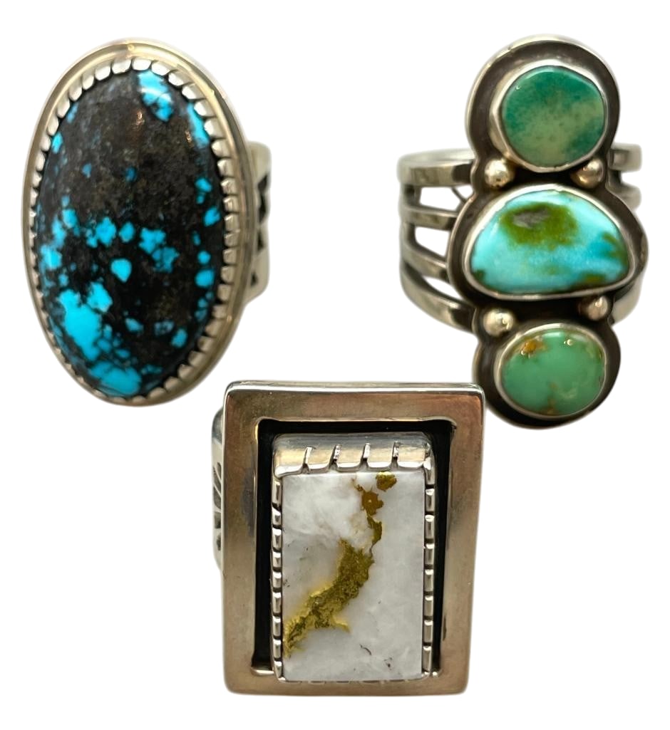 Phenomenal Three Ring Lot by Tommy Jackson: Offered here for your consideration is a phenomenal three ring lot by Tommy Jackson. Two of the rings feature turquoise cabochons while the third showcases a quartz stone highlighted with a gold strea