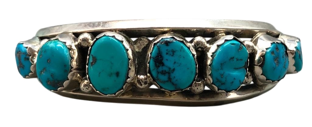 Seven Stone Turquoise And Sterling Silver Bracelet: Offered here for your consideration is a seven stone turquoise and sterling silver bracelet. This piece features seven turquoise cabochons set in scalloped silver bezels accented with silver dots. Com