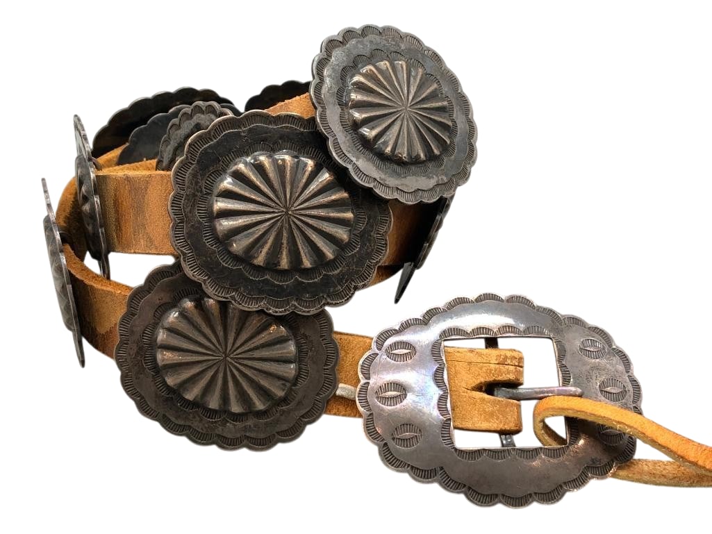 Vintage Sterling Silver Concho Belt Circa 1930s - 1940s: Offered here for your consideration is a vintage sterling silver concho belt circa 1930s - 1940s. This piece features 11 oval conchos and an oval buckle highlighted with repousse, scalloped edges and 
