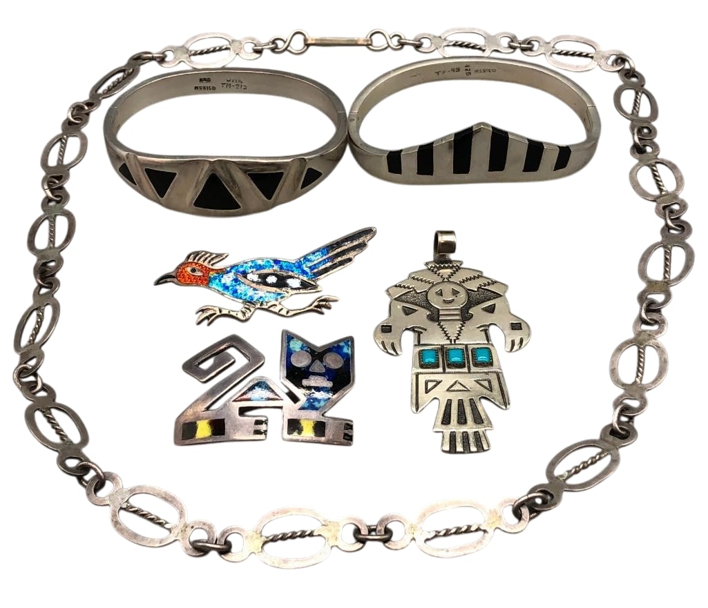 Group Of Miscellaneous Mexico And Bell Trading Post Jewelry Lot: Offered here for your consideration is a group of miscellaneous Mexico and Bell Trading Post jewelry lot. This lot features a variety of items including two silver bracelets with jet inlay, a silver l