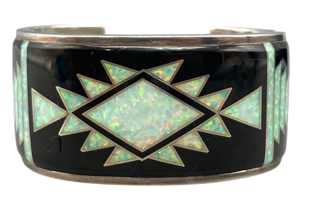 Inlay And Sterling Silver Bracelet - Collaboration of Ronnie Willie and Valontin A.: Presented for your consideration is an inlay and sterling silver bracelet. This beautiful bracelet features a flush inlay design created with opal and onyx. The setting is displayed on a solid silver 