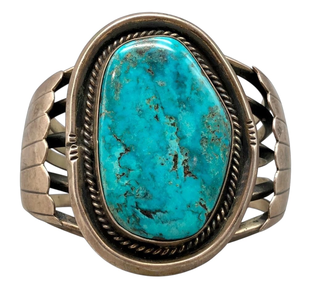 Vintage Turquoise And Sterling Silver Bracelet With Nice Turquoise: For your bidding enjoyment we present a vintage turquoise and sterling silver bracelet with nice turquoise. This bracelet features a great turquoise cabochon set in a handmade silver bezel. Surroundin