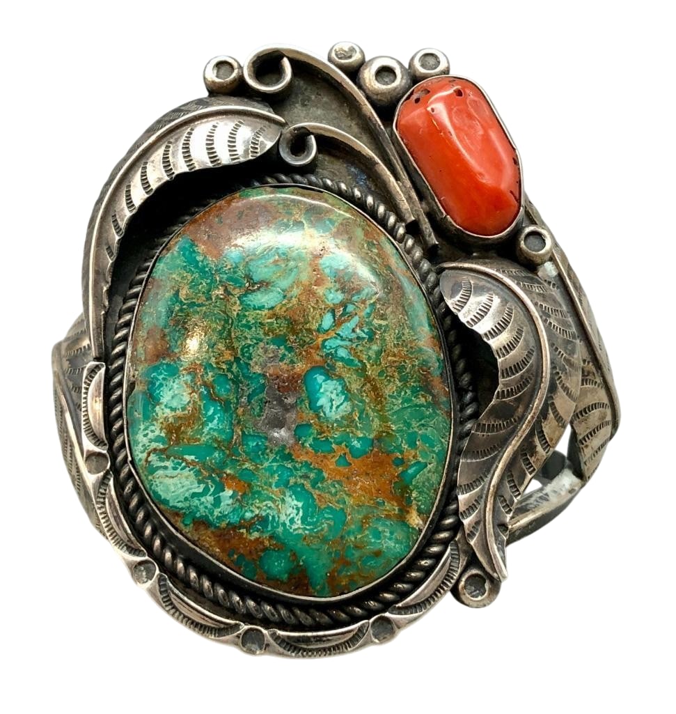 Vintage Turquoise And Coral Bracelet By Ted Charley: For your bidding enjoyment we present a vintage turquoise and coral bracelet by Ted Charley. This bracelet features a nice turquoise and coral cabochon, both set in a smooth silver bezels. Accenting t