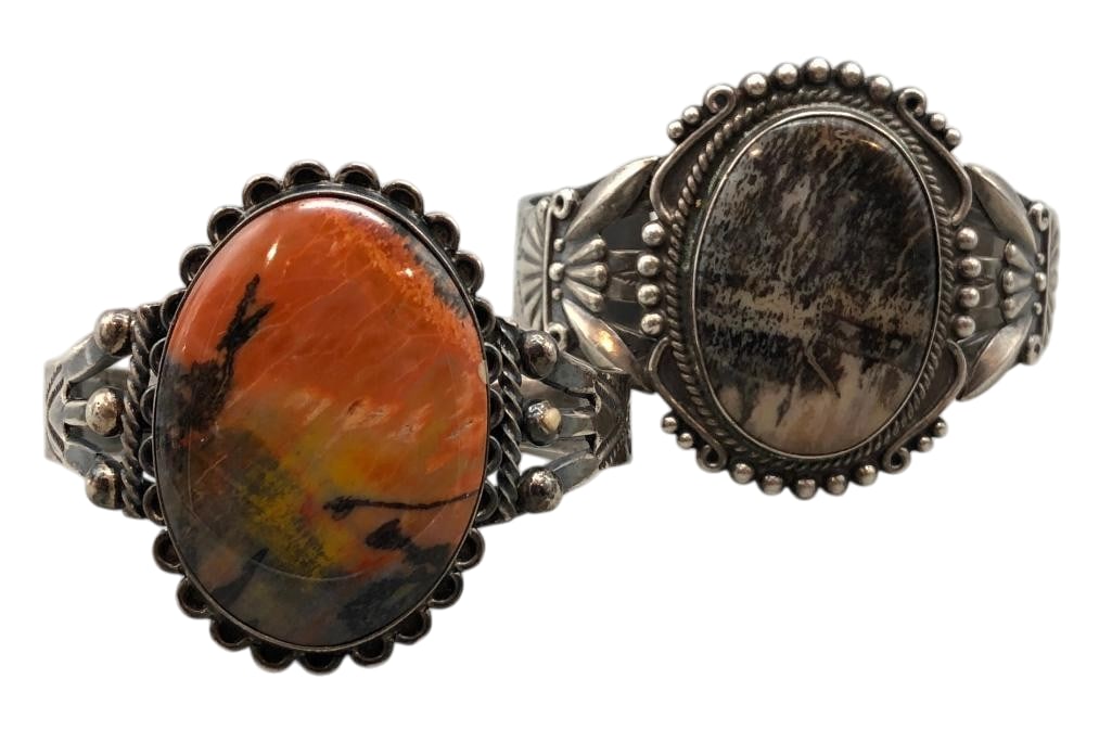 Two Vintage Petrified Wood And Sterling Silver Bracelets: Offered here for your consideration are two vintage petrified wood and sterling silver bracelets. Both of these pieces feature a petrified wood cabochon set in a smooth silver bezel. Accenting the sto