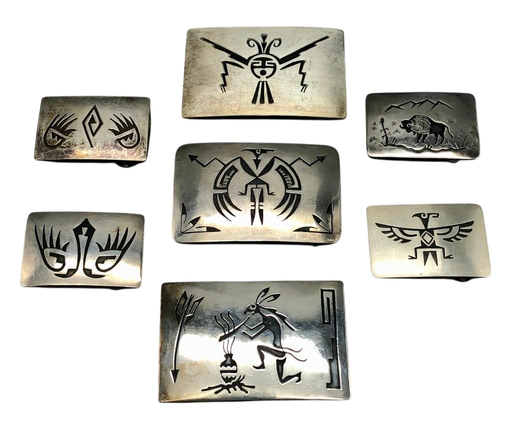 Seven Sterling Silver Buckles By Willie Yazzie, Jr.: For your bidding pleasure are seven sterling silver buckles by Willie Yazzie, Jr. These buckles feature a variety of patterns including figures, bison, birds and more with near perfect cut outs and li