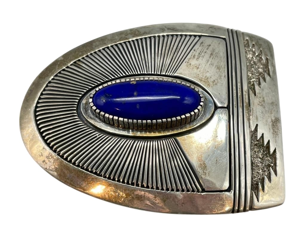 Sterling Silver And Lapis Belt Buckle By Gibson Nez: Available here for your consideration is a sterling silver and lapis belt buckle by Gibson Nez. This sterling silver belt buckle showcases an oval lapis cabochon set in serrated silver bezel. Accentin