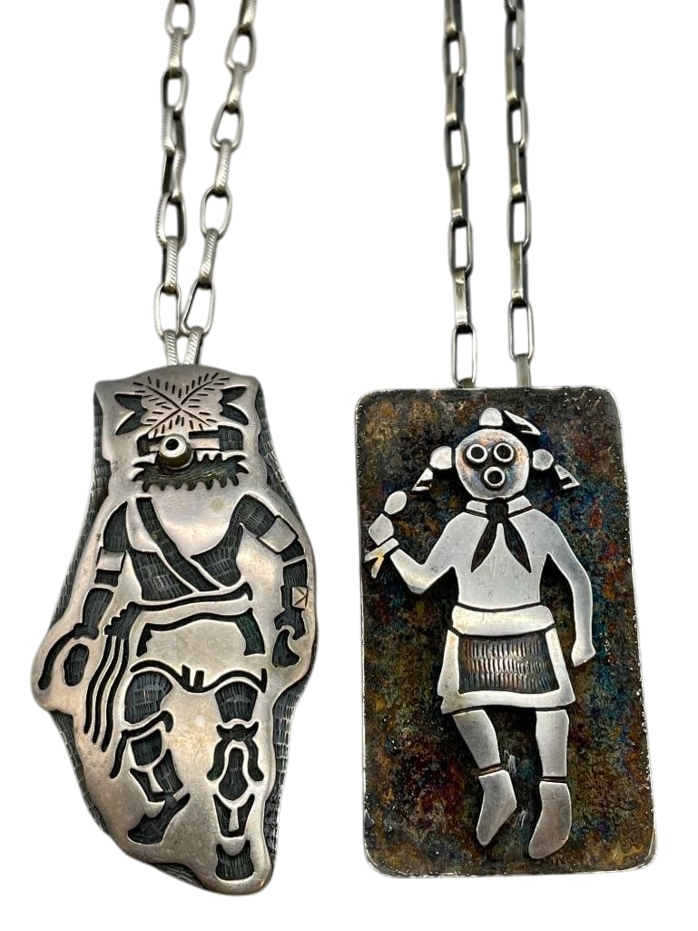 Two Sterling Silver Hopi Necklaces: Available here for your consideration are two sterling silver Hopi necklaces. Each necklace showcases an intricately crafted Kachina pendant created using the overlay technique. One pendant is set aga