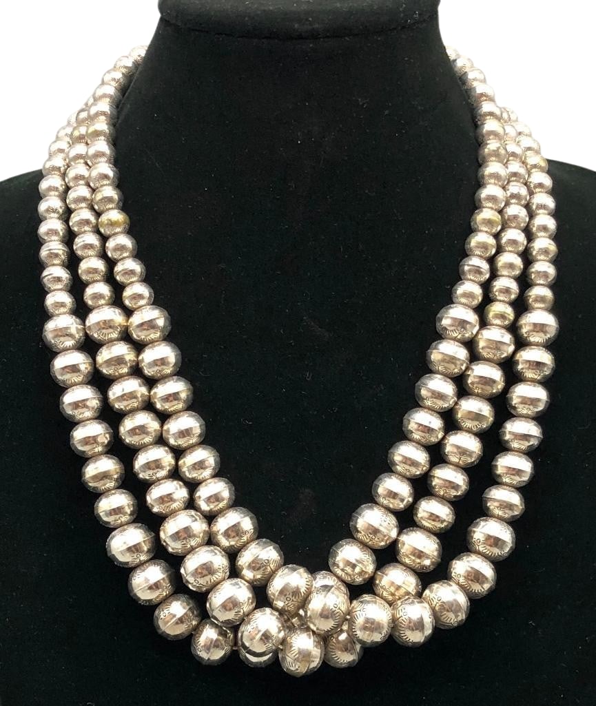 Three Sterling Silver Graduated Bead Necklaces: Offered here for your consideration are three sterling silver graduated bead necklaces. These necklaces each feature a strand of hand stamped silver beads in graduated sizes. The beads are all strung 